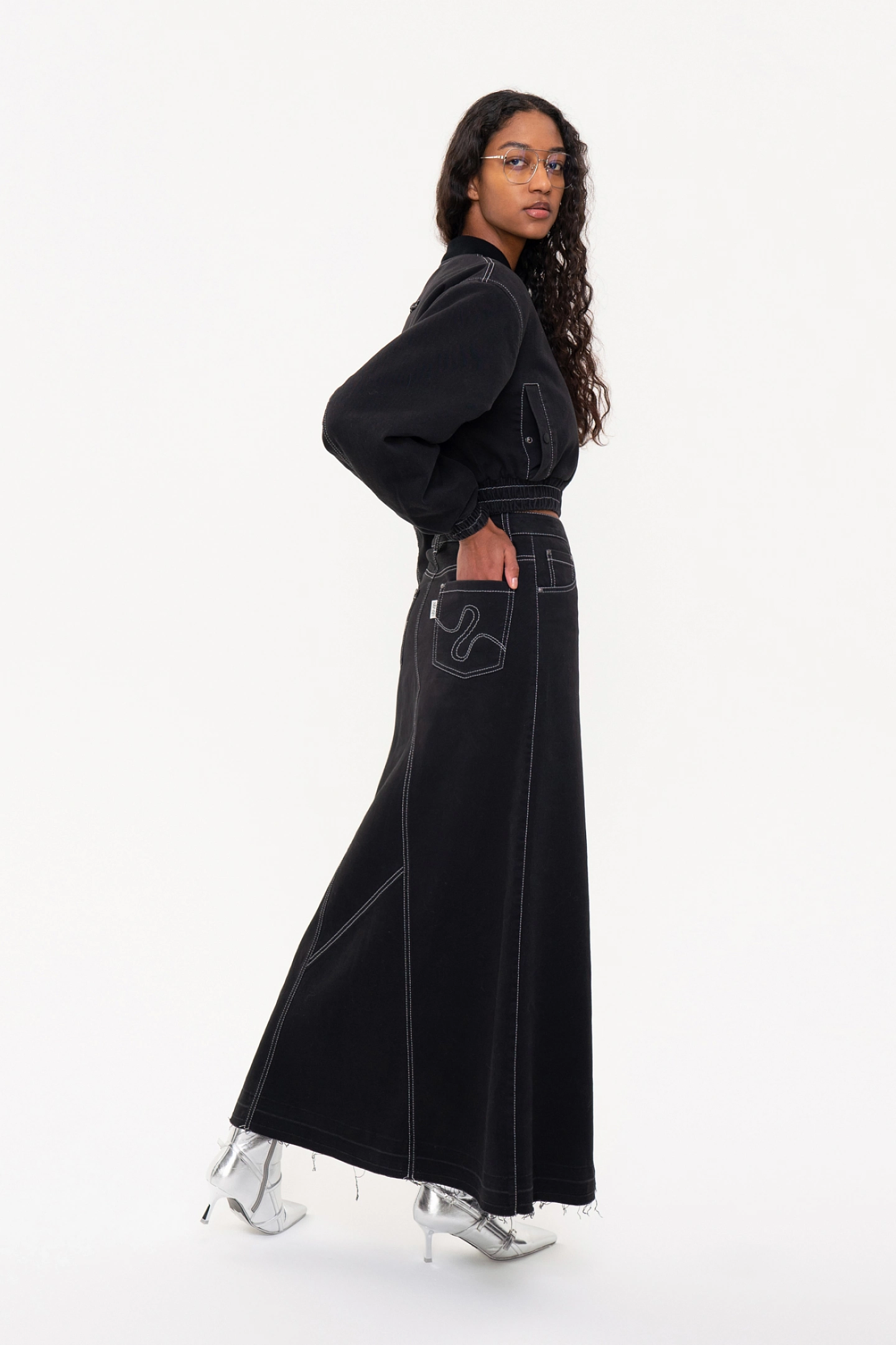 Short bomber jacket with wide sleeves  and a denim maxi skirt