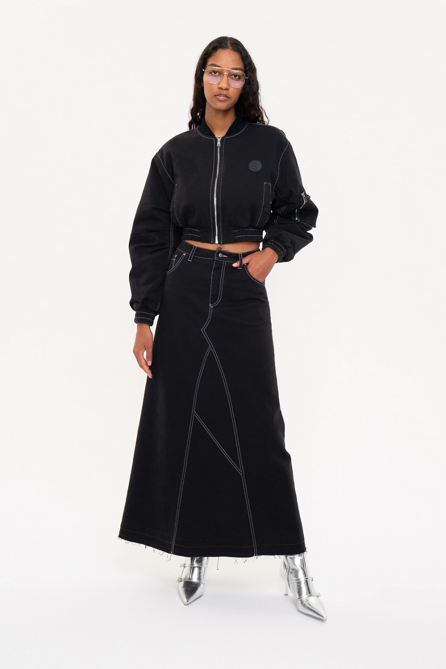 Short bomber jacket with wide sleeves  and a denim maxi skirt