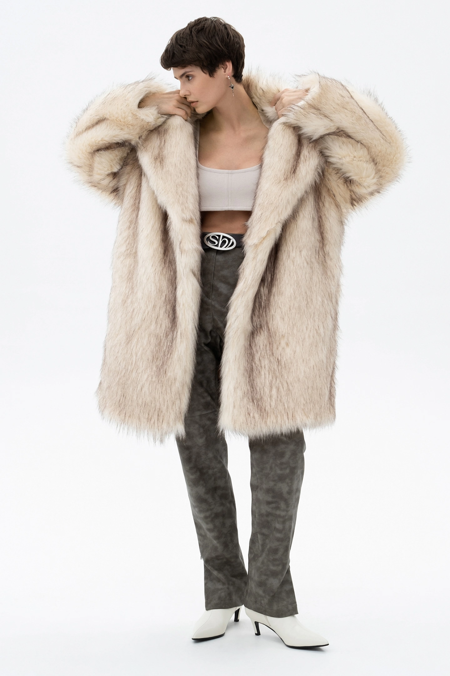 Double-breasted fur coat with a deflated shoulder