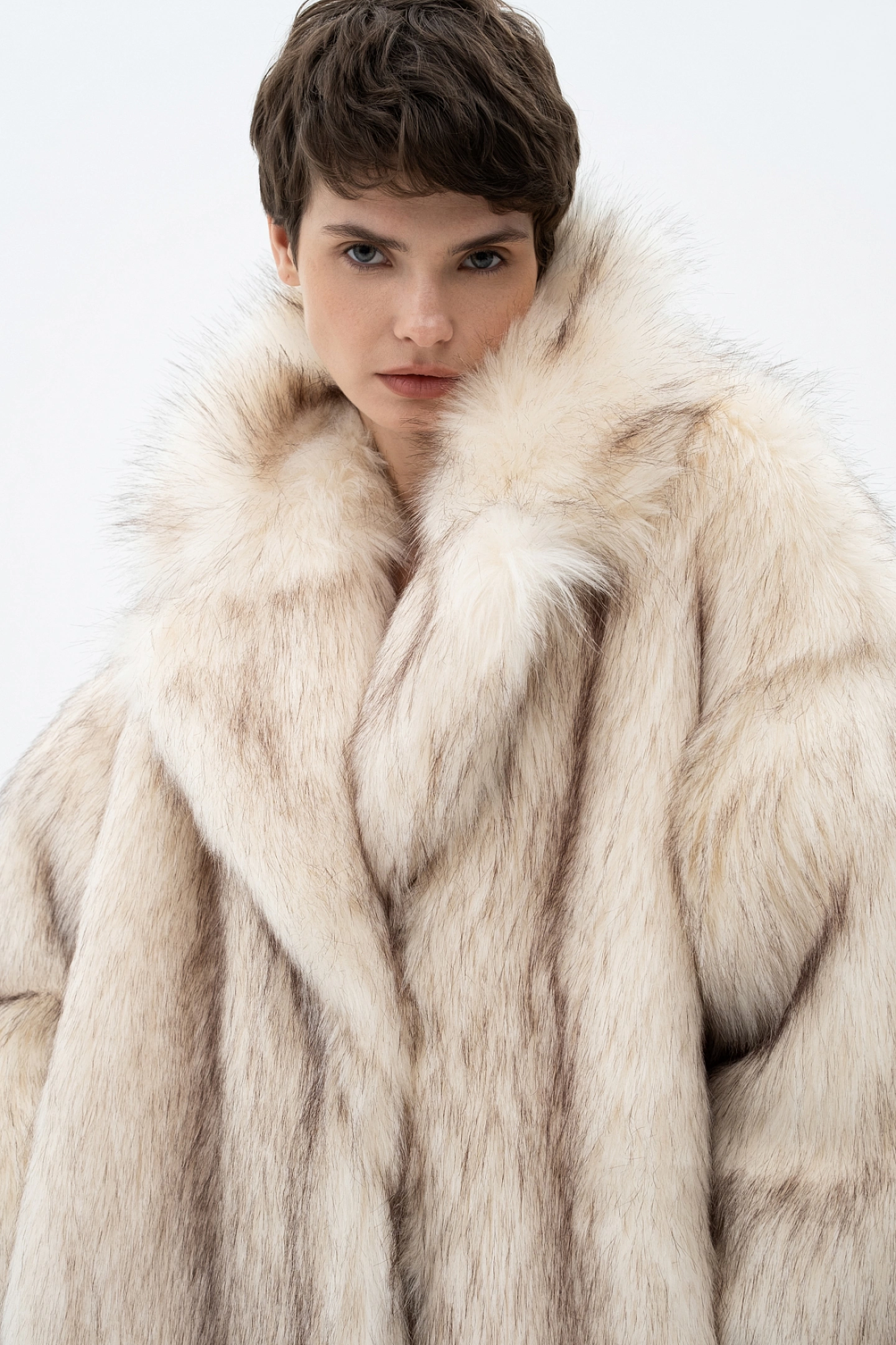 Double-breasted fur coat with a deflated shoulder