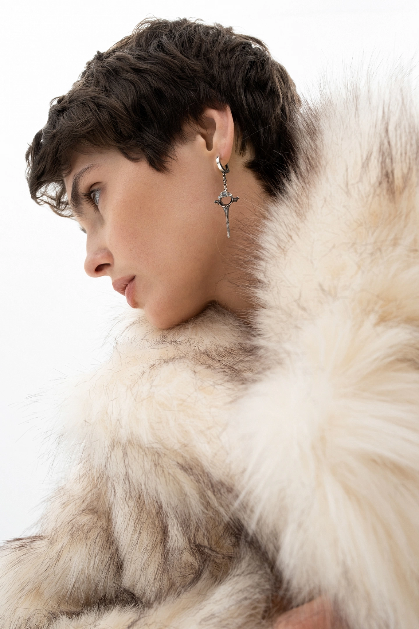 Double-breasted fur coat with a deflated shoulder
